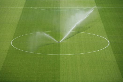 a empty soccerfield in a stadion...........