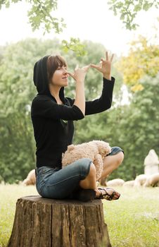 A lady seating outdoors