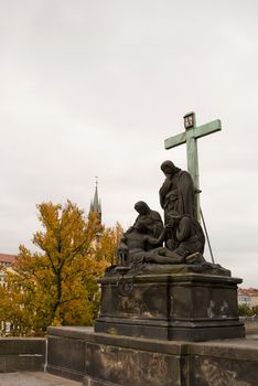 Descent from the Cross statue at Charles bridge in Prague