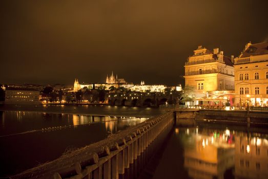 Castle and Charles bridge in Prague at night time
