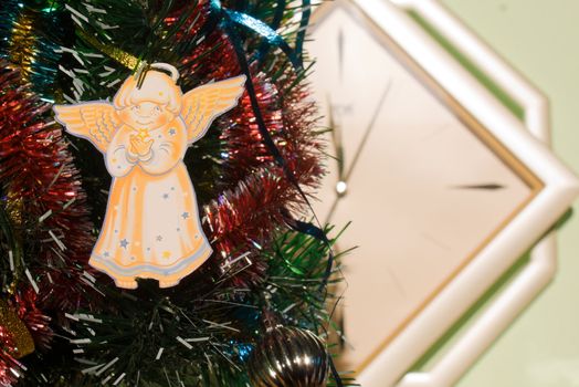Angel hanging on Christmas tree