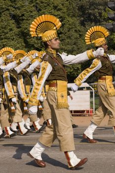 Soldier in bright yellow trimmed uniform parading down the Raj Path in preparation for the Republic Day Parade, New Delhi, India