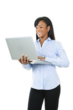 Young smiling  black woman standing with laptop computer