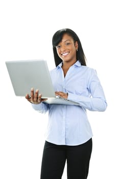 Young smiling  black woman standing with laptop computer