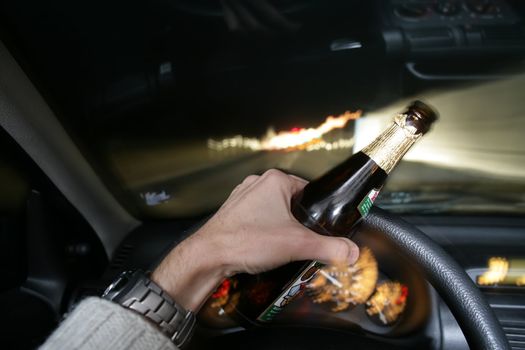 drinking beer while driving car