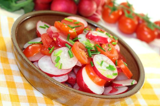 fresh radish and tomato salad with chives