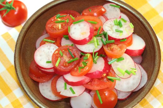 fresh radish and tomato salad with chives