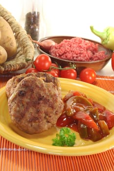 fried meatballs with Letscho and fresh parsley