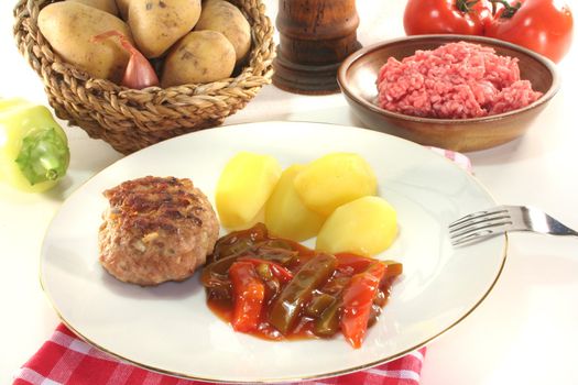 fried meatballs with Ratatouille and fresh potatoes