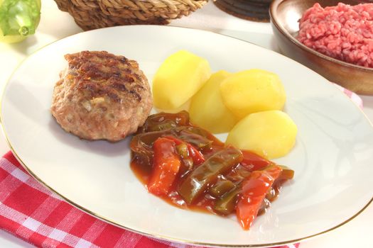 fried meatballs with Ratatouille and fresh potatoes