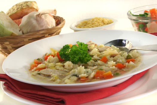 Chicken soup with chicken and fresh vegetables