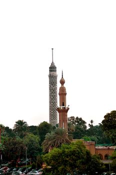 An image of a minaret and the Cairo TV Tower , Cairo, Egypt