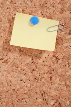 a pinboard with thumtacks on it...........
