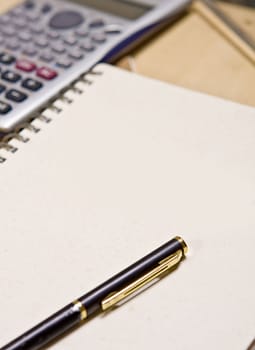 pen on book
