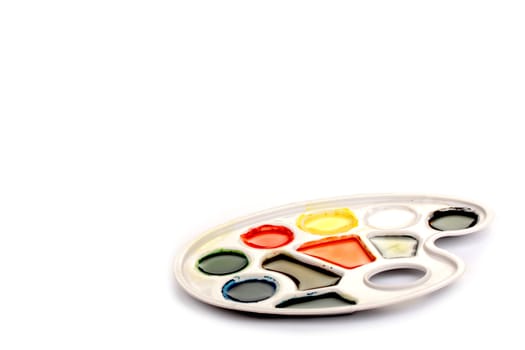 Watercolour Palette isolated against white background. In the right corne of the image