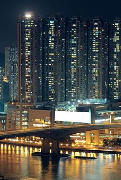 Night shot of a city skyline.