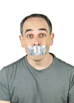 Portrait of man with duct tape over his mouth