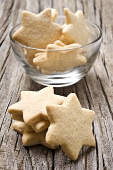 Sugar coated shortbread cookies in star shapes stacked up