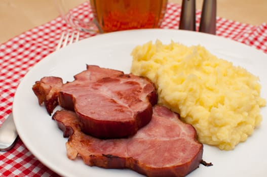 Czech Cuisine - Smoked Pork Meat With Potato Purée With Beer Served on Table