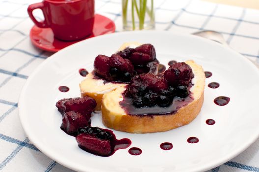 Sponge Roll With Cream and Forest Fruit