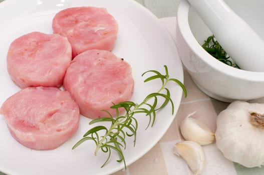 Raw Turkey Medallions With Garlic and Rosemary Marinade