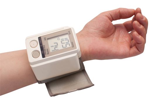 Measuring the Blood Pressure - Female Hand isolated on white - with clipping path