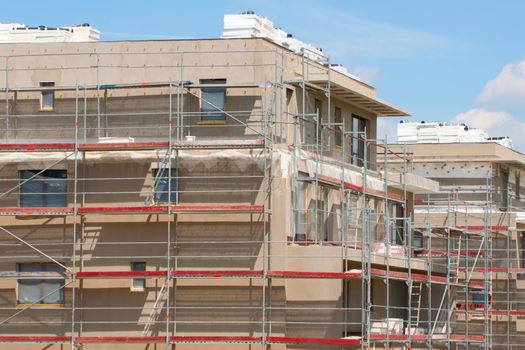 New Family Houses under Construction - With Scaffolding