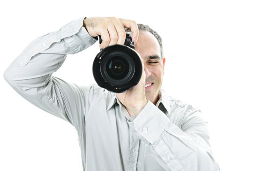 Portrait of male photographer with camera isolated on white background