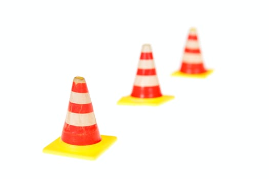 Row of road warning cones isolated on the white background