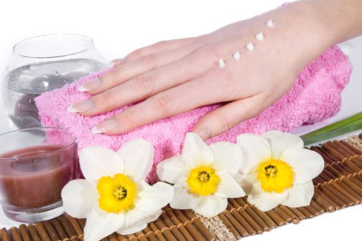 Woman hand with cream on spa treatment