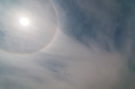 Shot of halo on blue sky - natural phenomen