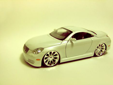 Yellow filter over a shot of this Lexus diecast.