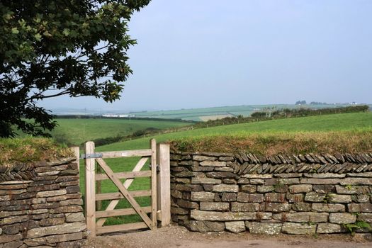 Entry into a field through gate in a traditional dry-stone wall