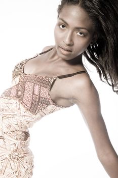 A beauty portrait taken from an african model in the studio showing off