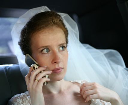 The bride with the phone in car