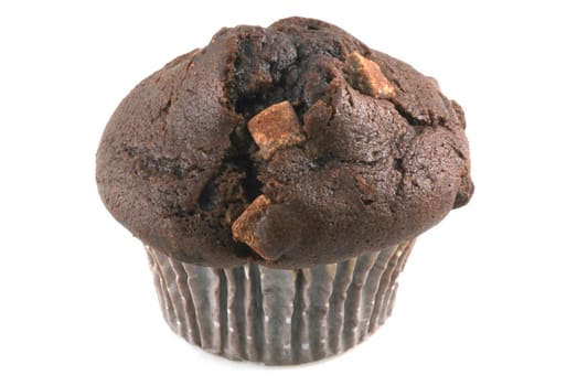 Close up of a chocolate muffin isolated on white.