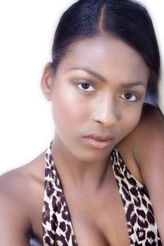 A beauty portrait taken from an african model in the studio in a serious pose