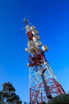 Communications tower with a beautiful blue sky