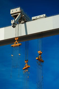 Cranes of the dockyards of Cadiz in a sunny day