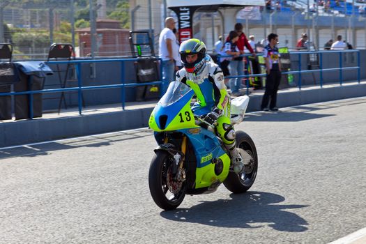 JEREZ DE LA FRONTERA, SPAIN - APR 17: Moto2 motorcyclist Renaud Binoche leave the pits in the CEV Championship race on April 17, 2011 in Jerez de la Frontera, Spain.