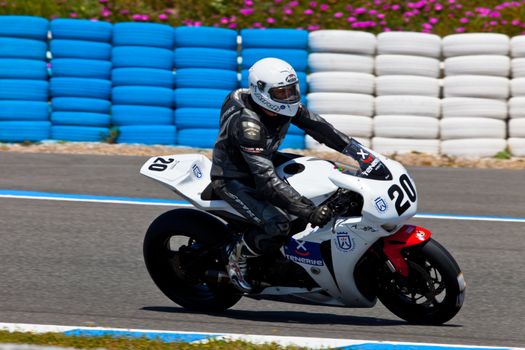 JEREZ DE LA FRONTERA, SPAIN - APR 17: Stock Extreme motorcyclist Juan Alonso takes a curve in the CEV Championship race on April 17, 2011 in Jerez de la Frontera, Spain