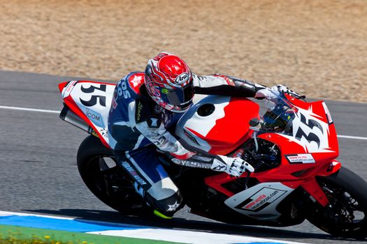 JEREZ DE LA FRONTERA, SPAIN - APR 17: Stock Extreme motorcyclist Luis Fernando Sainz takes a curve in the CEV Championship race on April 17, 2011 in Jerez de la Frontera, Spain