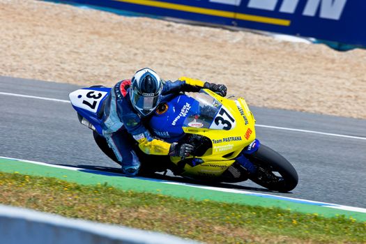 JEREZ DE LA FRONTERA, SPAIN - APR 17: Stock Extreme motorcyclist Jorge Arroyo takes a curve in the CEV Championship race on April 17, 2011 in Jerez de la Frontera, Spain