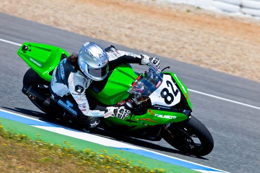 JEREZ DE LA FRONTERA, SPAIN - APR 17: Stock Extreme motorcyclist Elena Rosell takes a curve in the CEV Championship race on April 17, 2011 in Jerez de la Frontera, Spain
