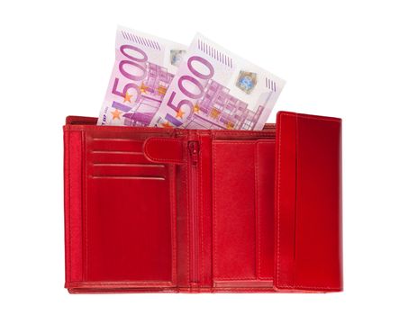 Red wallet with two five-hundred-euro banknotes isolated over a white background.