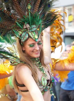 COPENHAGEN - JUNE 11: Participant in the 29th annual Copenhagen Carnival parade of fantastic costumes, samba dancing and Latin styles starts on June 10 - 12, 2011 in Copenhagen, Denmark.