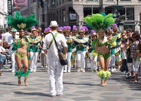 COPENHAGEN - JUNE 11: Participants in the 29th annual Copenhagen Carnival parade of fantastic costumes, samba dancing and Latin styles starts on June 10 - 12, 2011 in Copenhagen, Denmark.