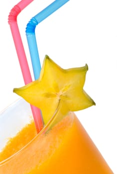 Papaya juice with Carambola and straws as decoration.