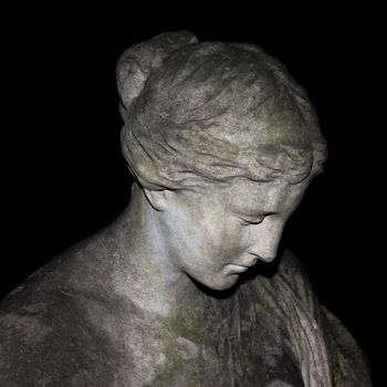 An image of a sad woman statue