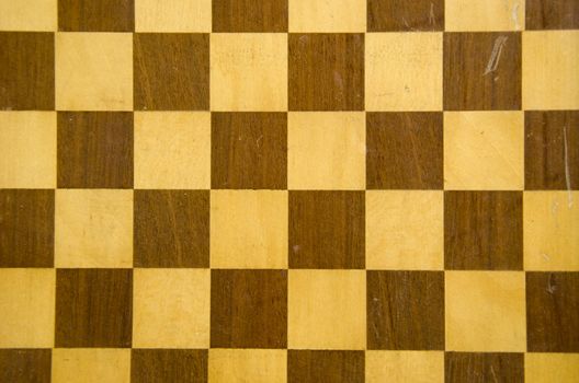 Background of chess or checkers board fragment.